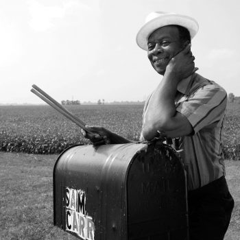 Sam Carr blues drummer near mailbox, Lula, MS