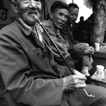 B&W portrait of old chinese man with pipe, Kunming, China