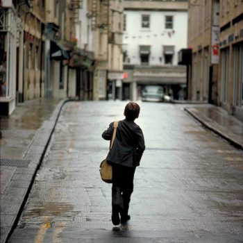 Young school boy from behind, Bath, England, UK