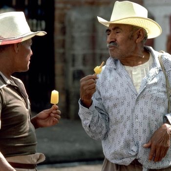 Two men with popsicles, Oaxaca, Mexico