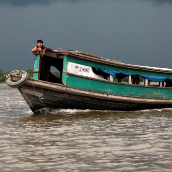 Boat on Amazon River, Peru. Opening Our Eyes Movie.