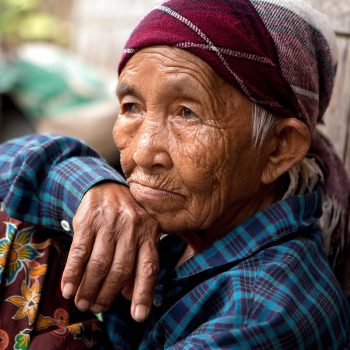Old woman in Hill tribe village, Thailand. Opening Our Eyes Movie.