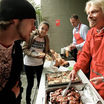 Sir Richard Branson serving homeless youth at the Oasis Youth Network, Sydney, Australia. Opening Our Eyes Movie.