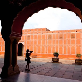 Silhouette of girl taking photo at Red Fort, Jaipur, India. Opening Our Eyes Movie.