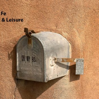Mailbox in adobe wall, Santa Fe, NM